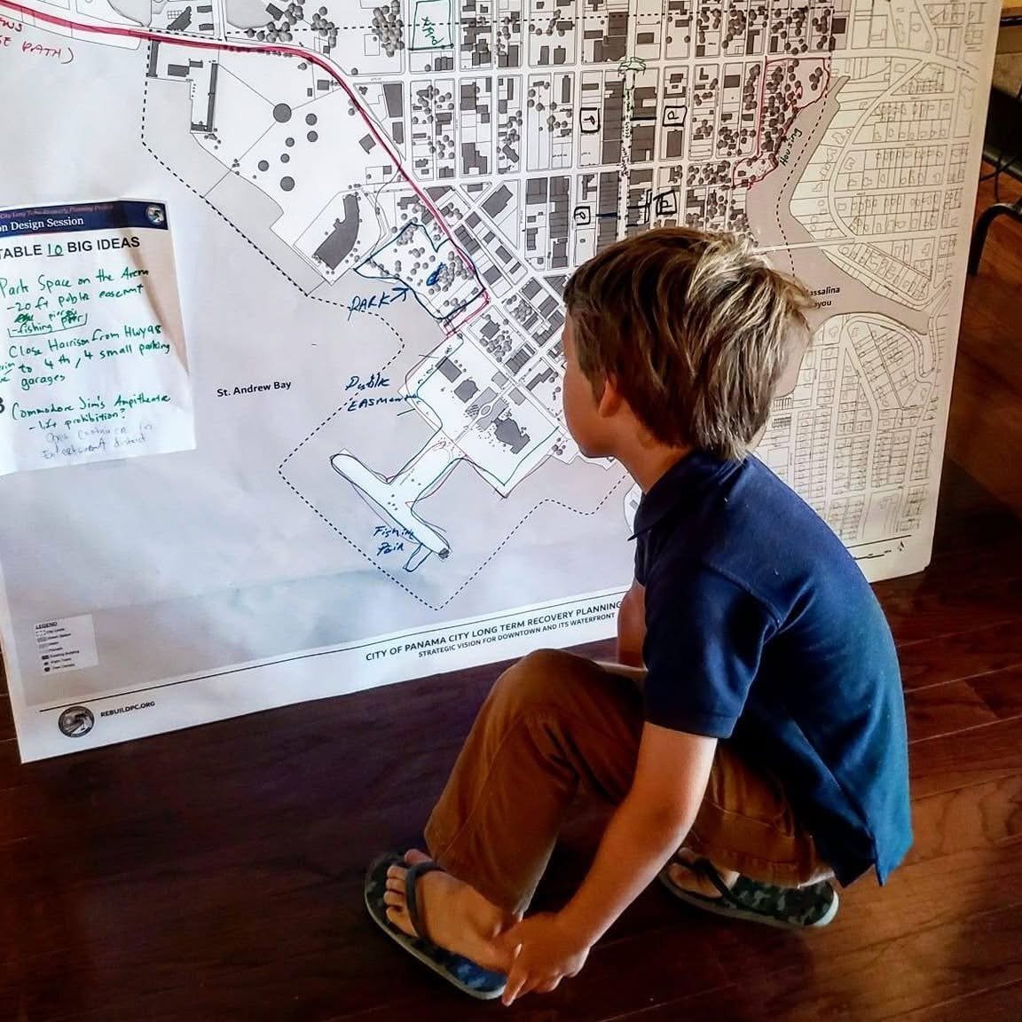 Young community member participating in a public input and planning workshop at the Center for the Arts in downtown Panama City, Florida.