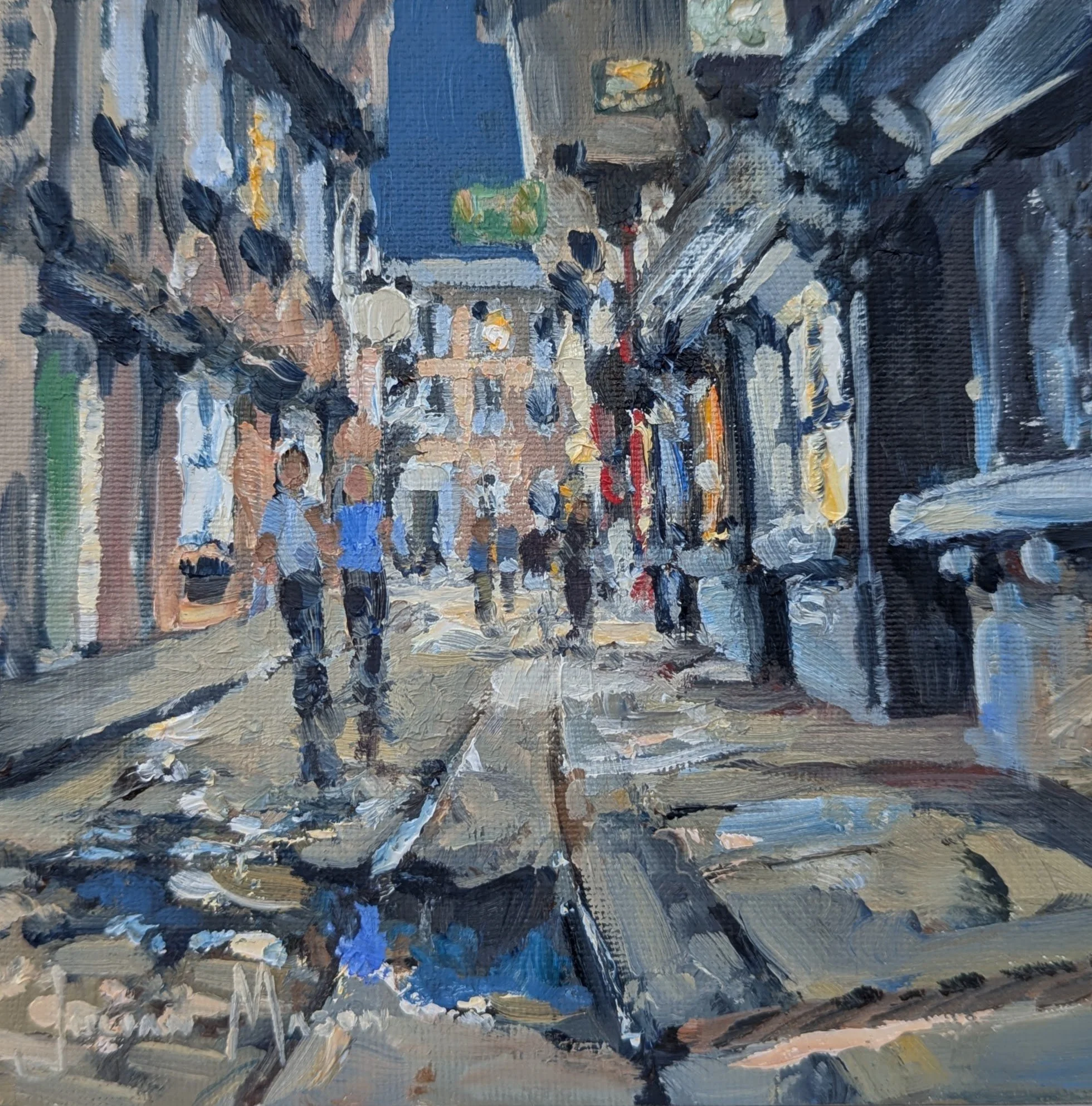 An impressionistic painting of a city street scene with buildings, pedestrians, and vehicles depicted with bold brushstrokes and vibrant colors.
