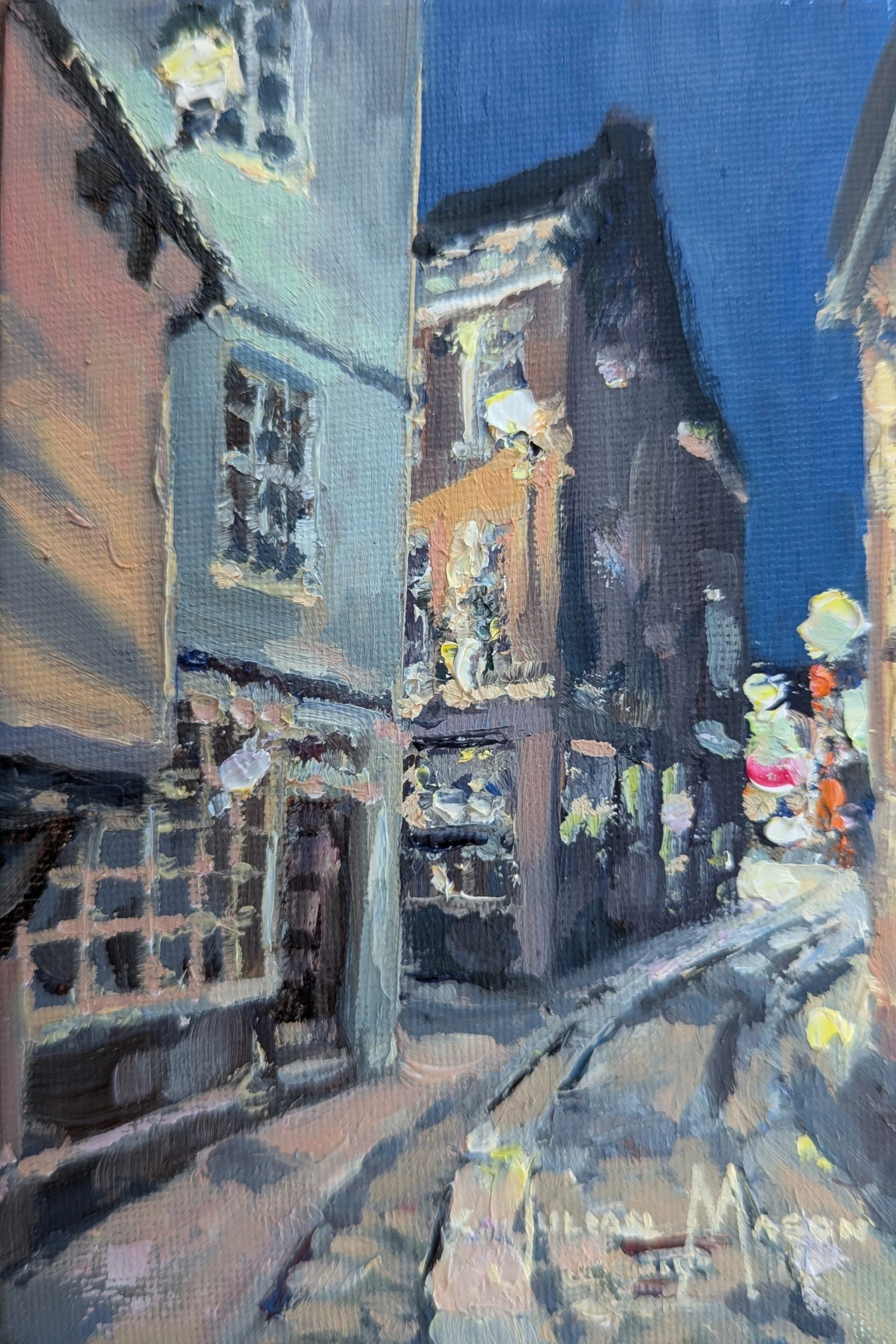 A detailed close-up view of a painted European street scene, featuring colorful buildings, a cobblestone street, flower boxes, and a bicycle, all rendered in an impressionistic style with thick, textured brushstrokes.