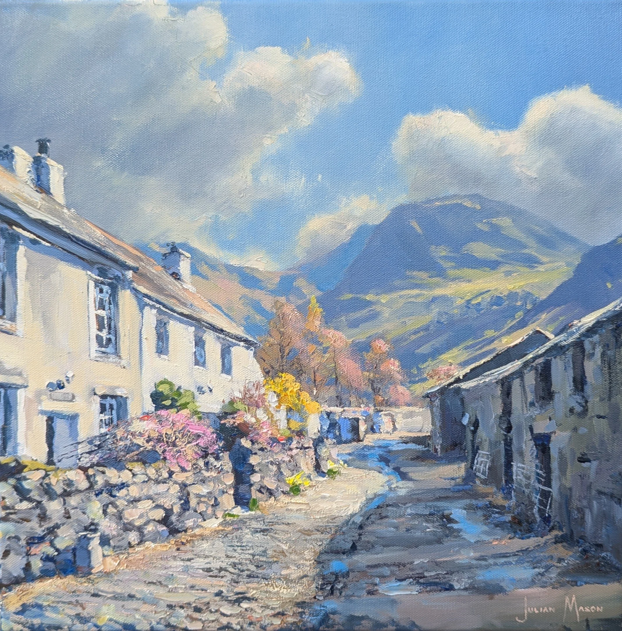 Impressionistic painting of a city street scene with flowering trees and buildings under a cloudy sky.