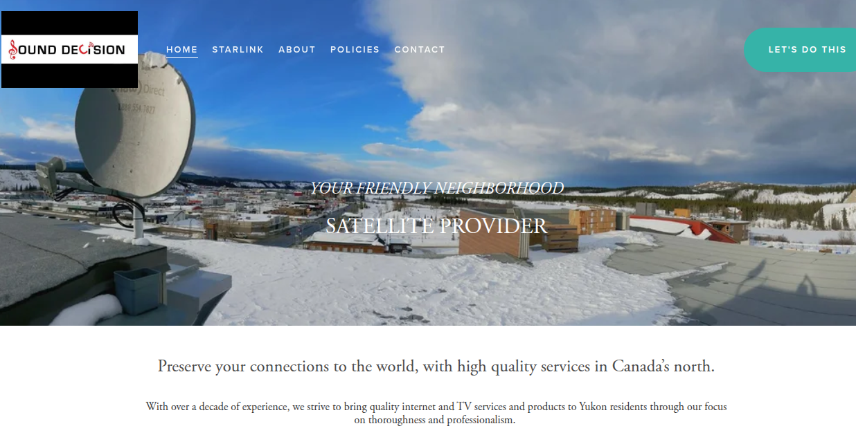 Website homepage for a satellite service provider showing a snowy rooftop with a satellite dish and a cityscape in the background under a partly cloudy sky.