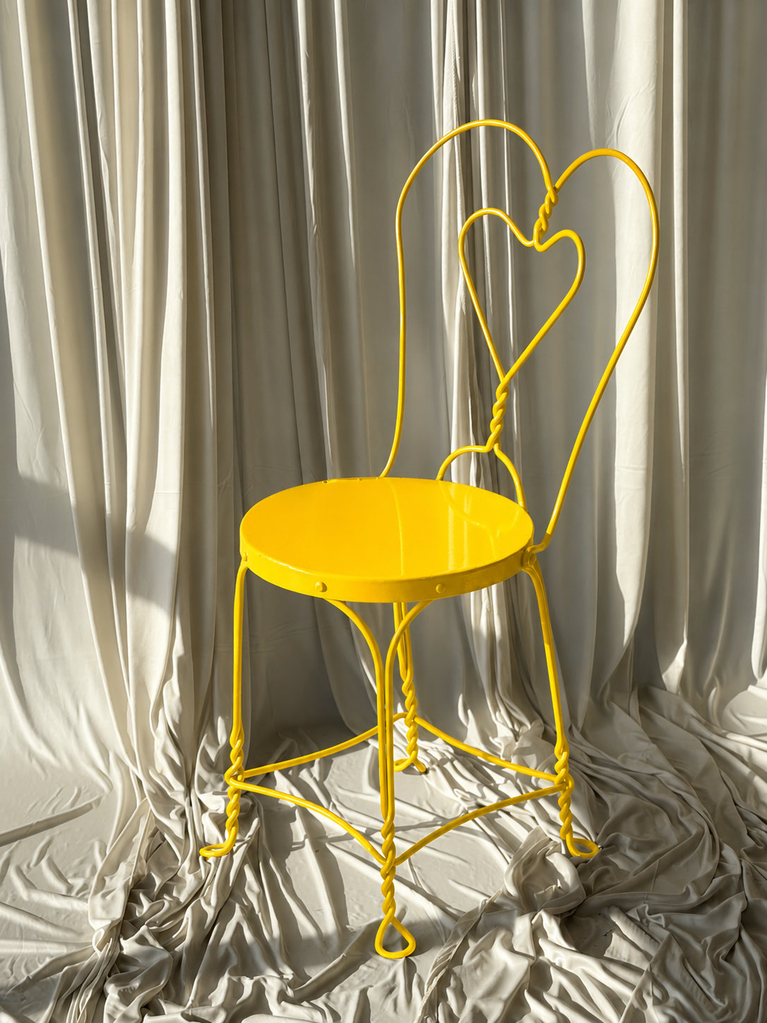 Yellow Metal Heart Back Chair