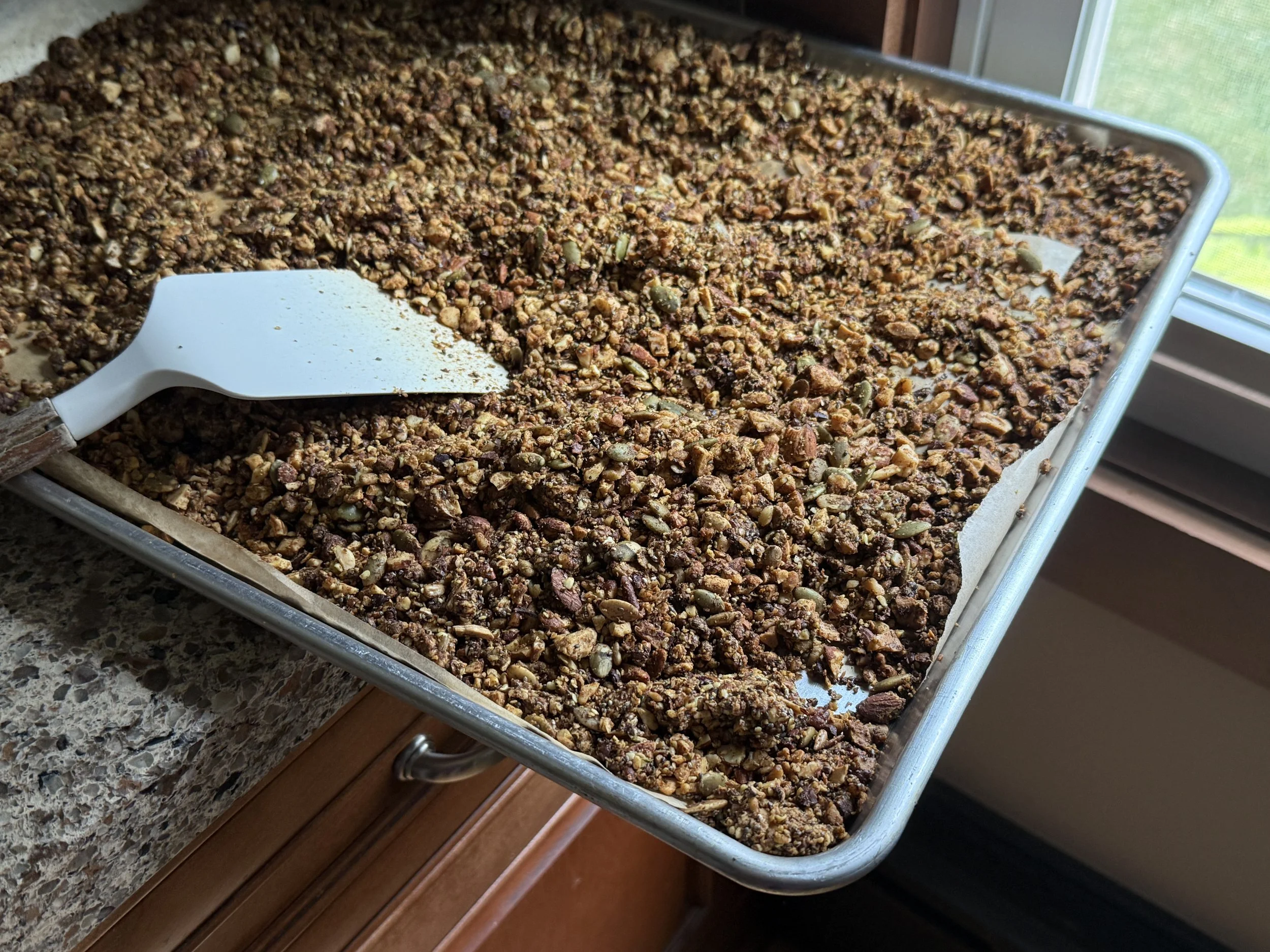 Close up of sheet pan of baked cereal