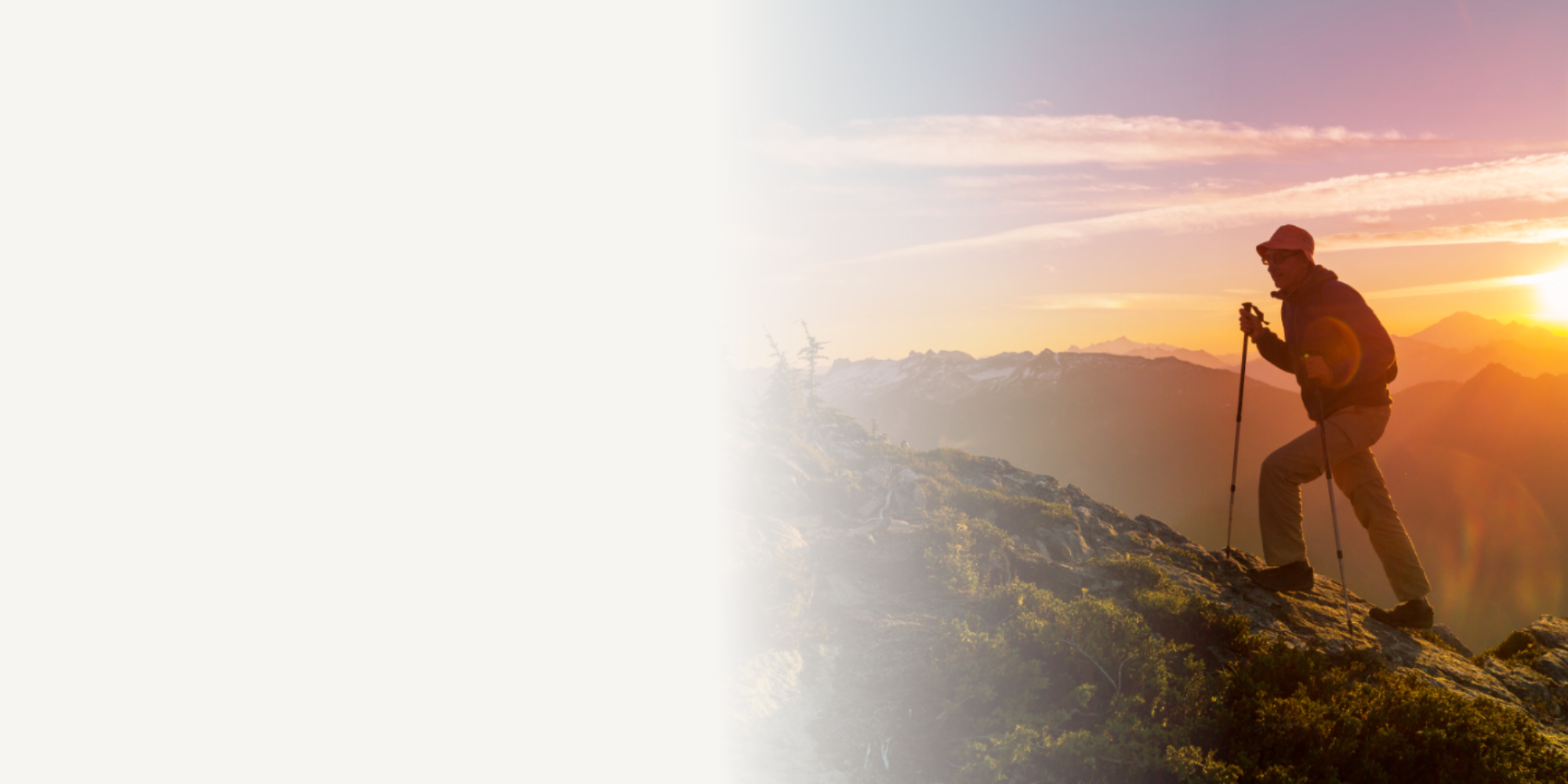 Person hiking towards a mountain summit at sunrise, symbolising strategic leadership, collaboration and sustainable growth for therapeutic providers and purpose-led organisations.