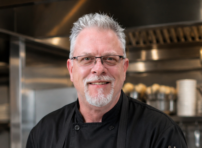 Casey Hanlon working in professional kitchen.