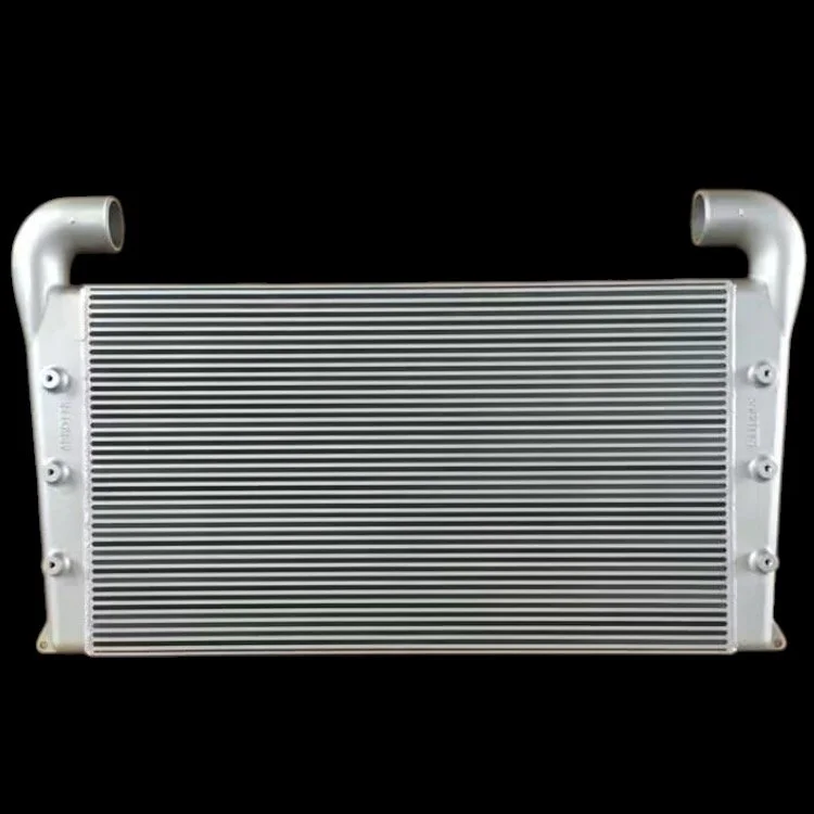 A silver automotive radiator with side tanks and cooling fins on a black background.