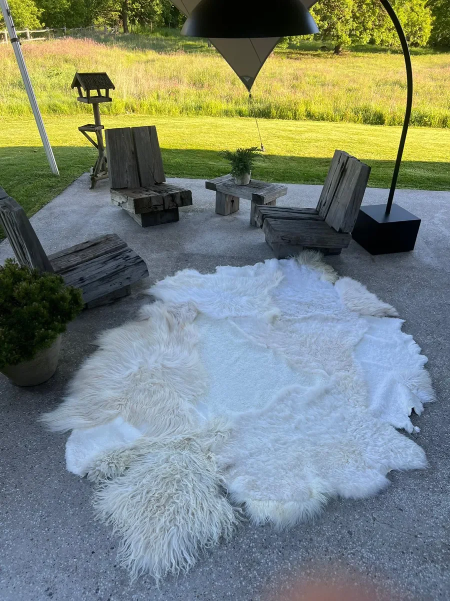 Pipkin by Wol Society, an ivory sheep skin rug with smooth, curly and fluffy textures