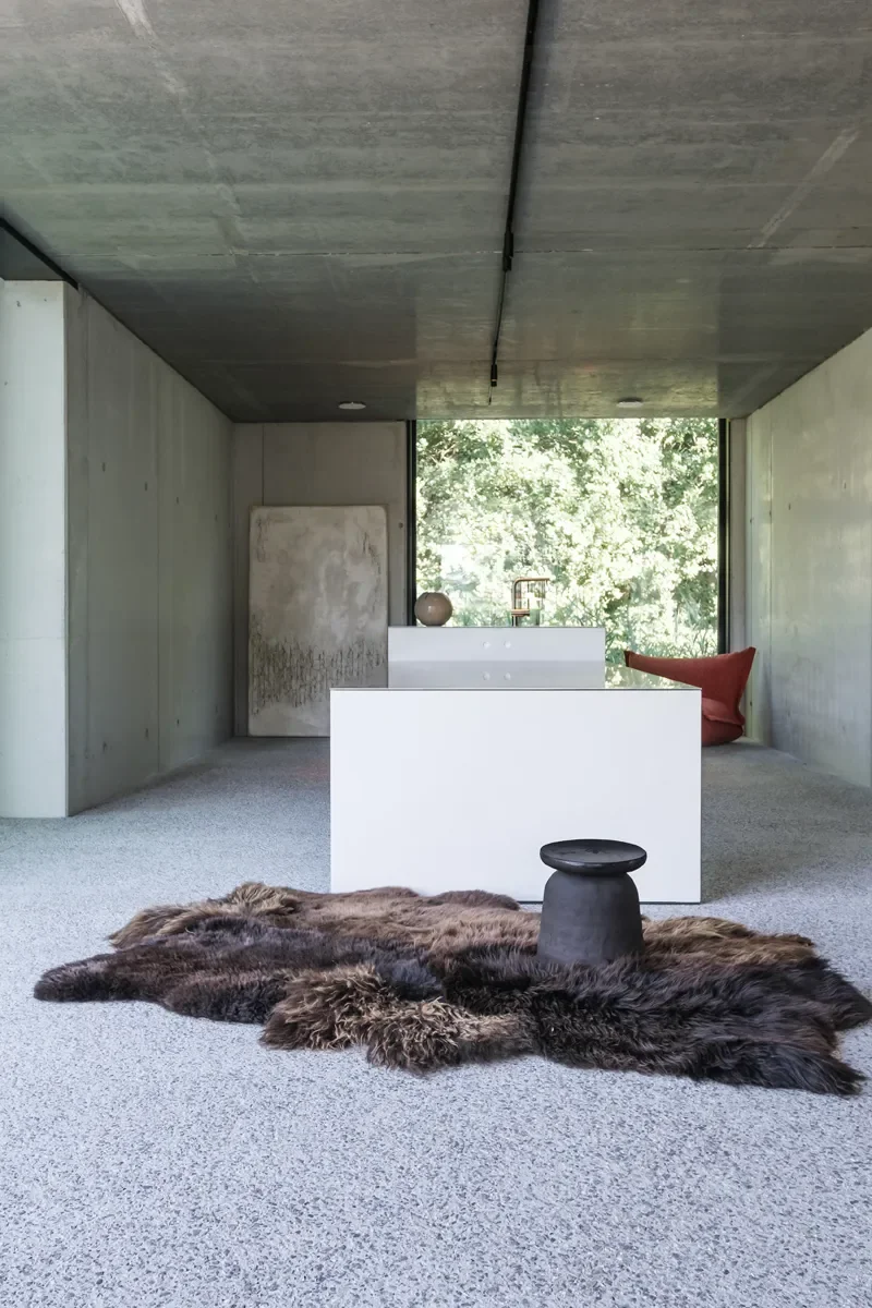 Toffee Twist by Wol Society, a shaggy dark chocolate sheep skin rug with toffee-colored tips