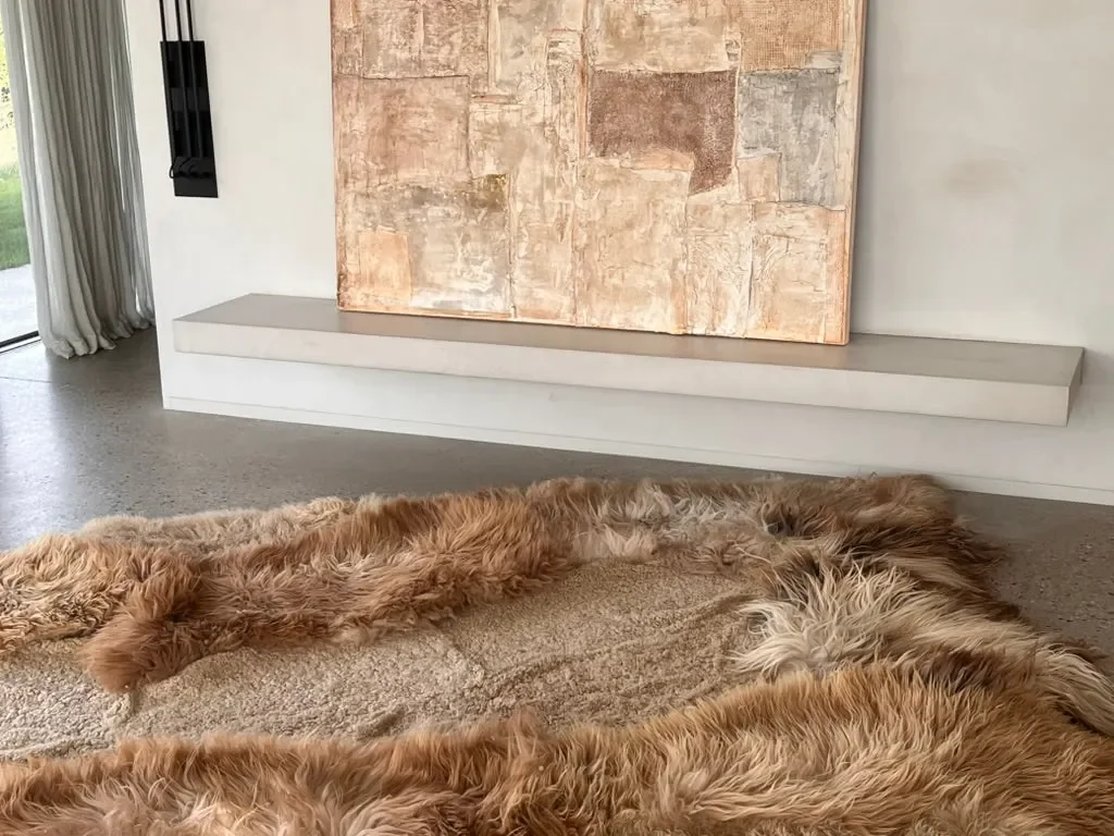 Big Dream by Wol Society, a giant sheepskin rug in caramel and cream with long, silky fleece