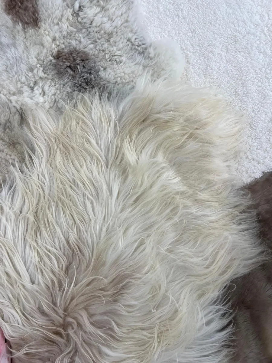 Tilly by Wol Society, a large ivory, grey and taupe patchwork sheepskin rug