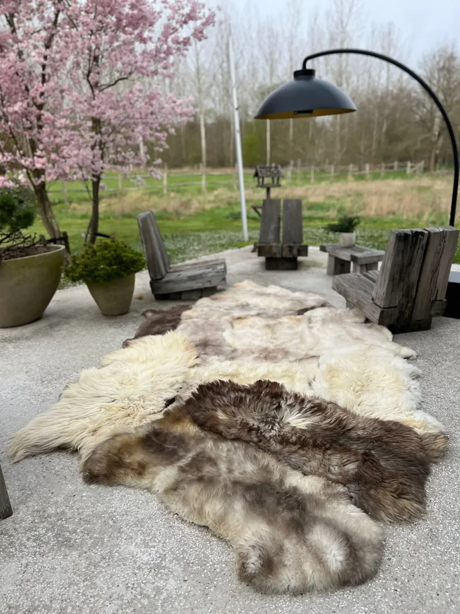 Willow by Wol Society, a giant creamy taupe Icelandic sheepskin rug with long, voluminous wavy curls
