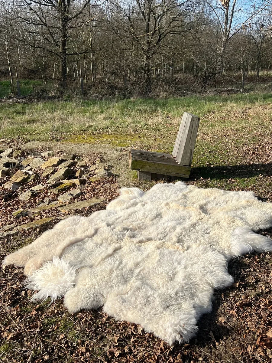Mono by Wol Society, an ivory sheep skin rug with long, gently wavy fleece