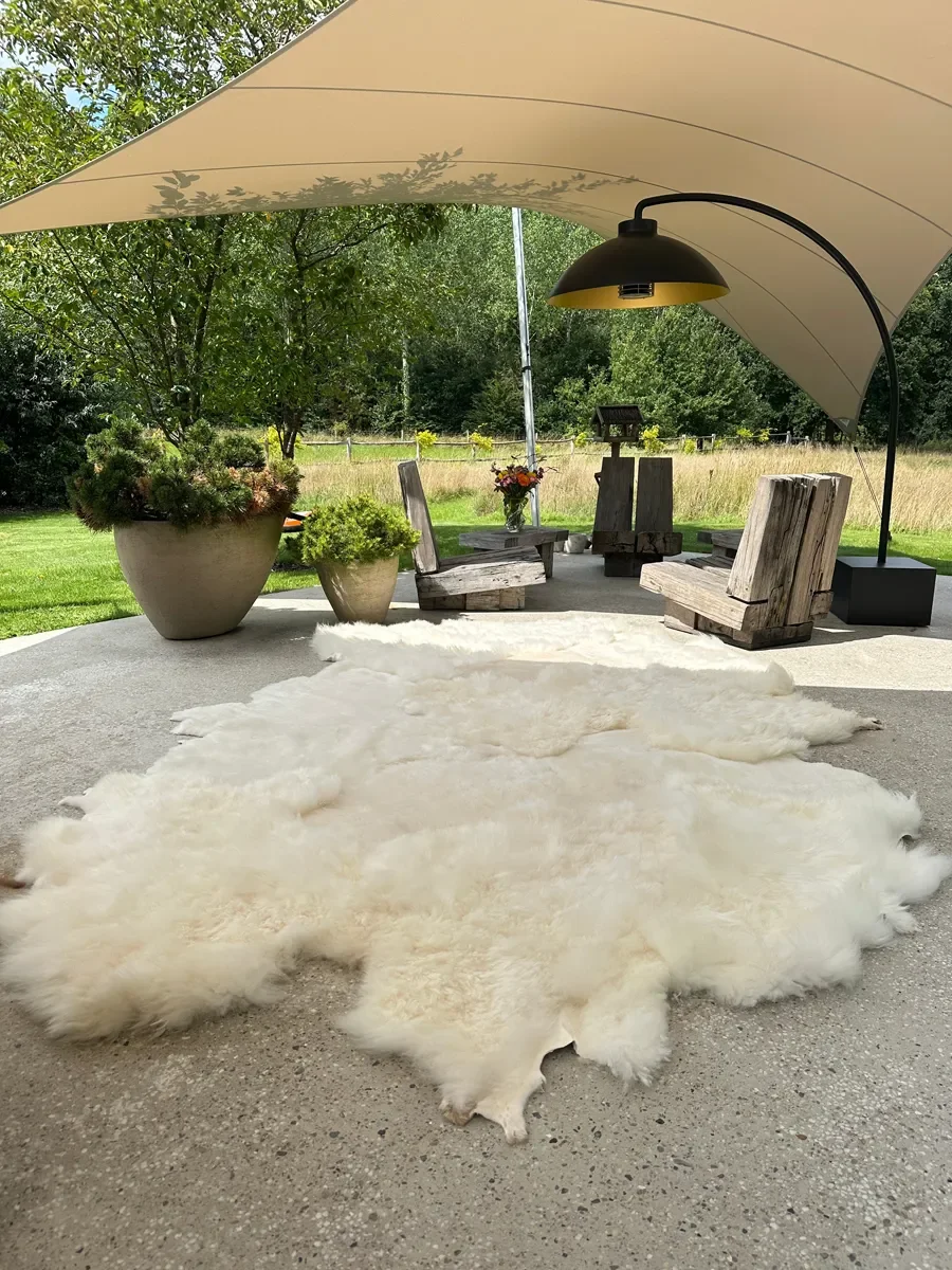 Mieke 195 by Wol Society, a giant creamy ivory sheep skin rug with plush, fluffy fleece