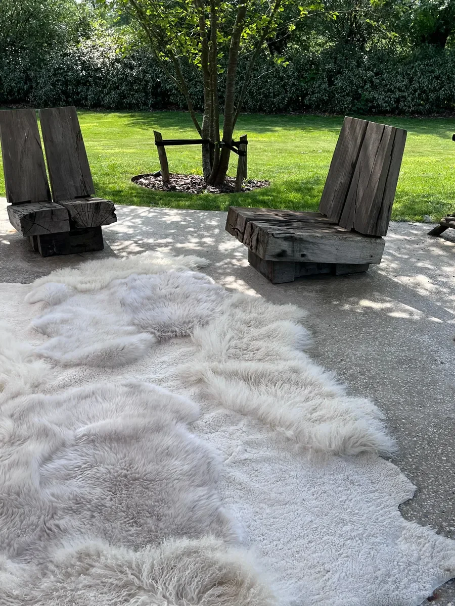Mango by Wol Society, an ivory sheep skin rug with soft patches of pale dove grey