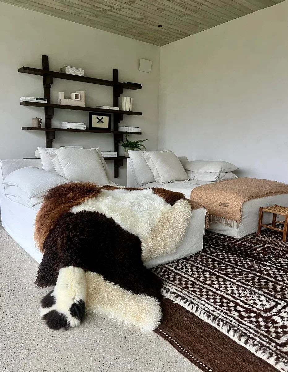 Mary by Wol Society, a brown and cream sheep skin rug with bands of cream between chocolate and russet fleece