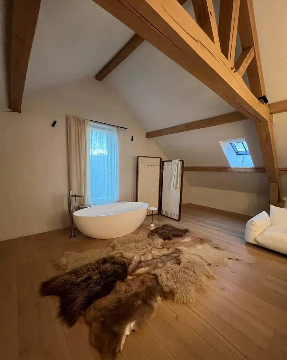 Cobra by Wol Society, a brown and cream patchwork sheepskin rug with long chestnut and curly cream fleece