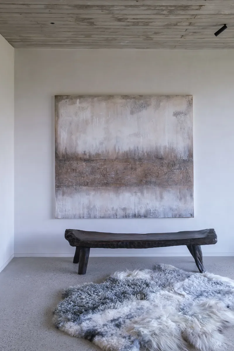 Silver Mist by Wol Society, an ivory and silver grey sheepskin rug with curly, frosted pelts