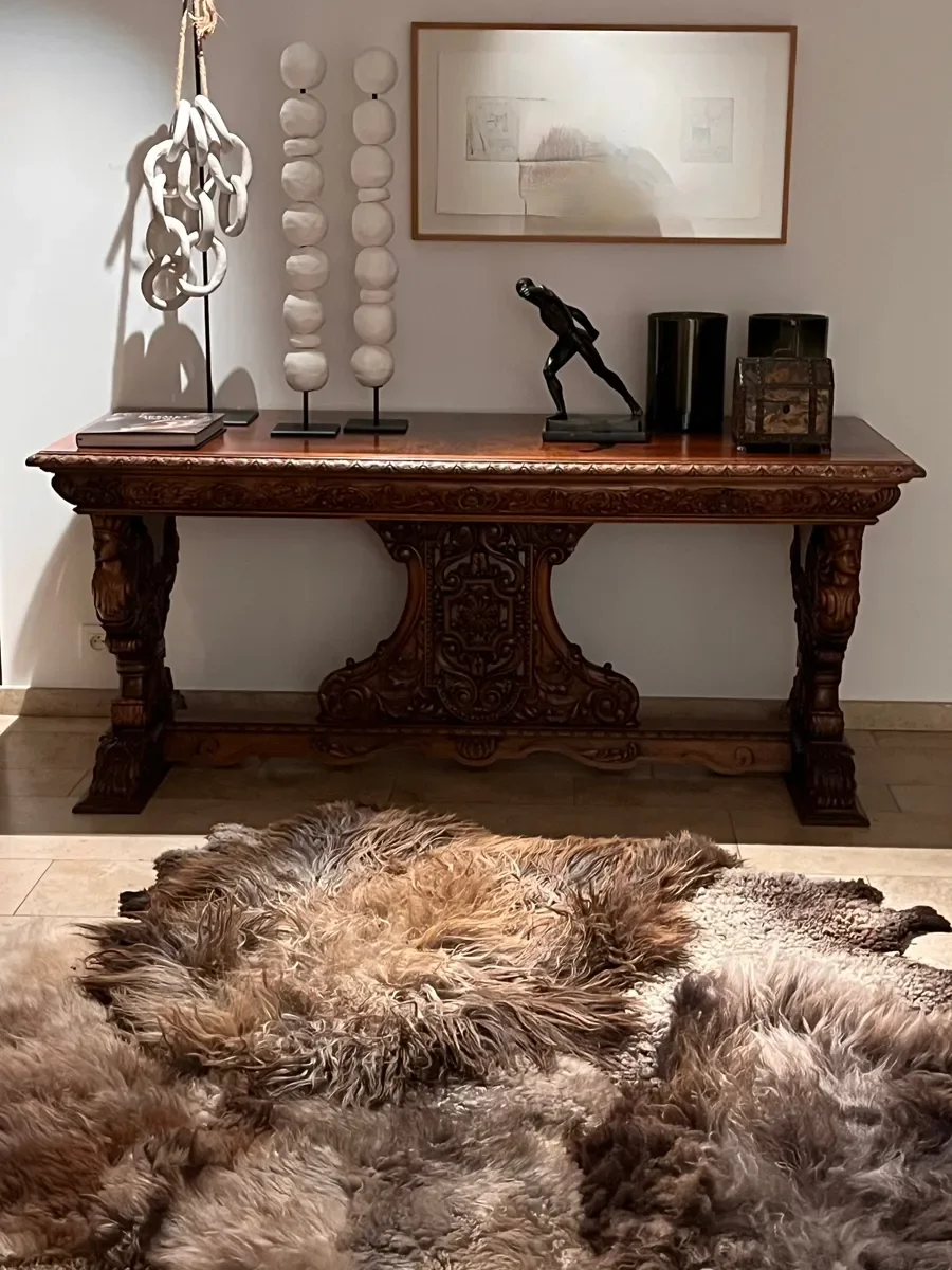 Him by Wol Society, a brown sheepskin rug with shaggy smoky-brown fleece and a close-curled cocoa pelt