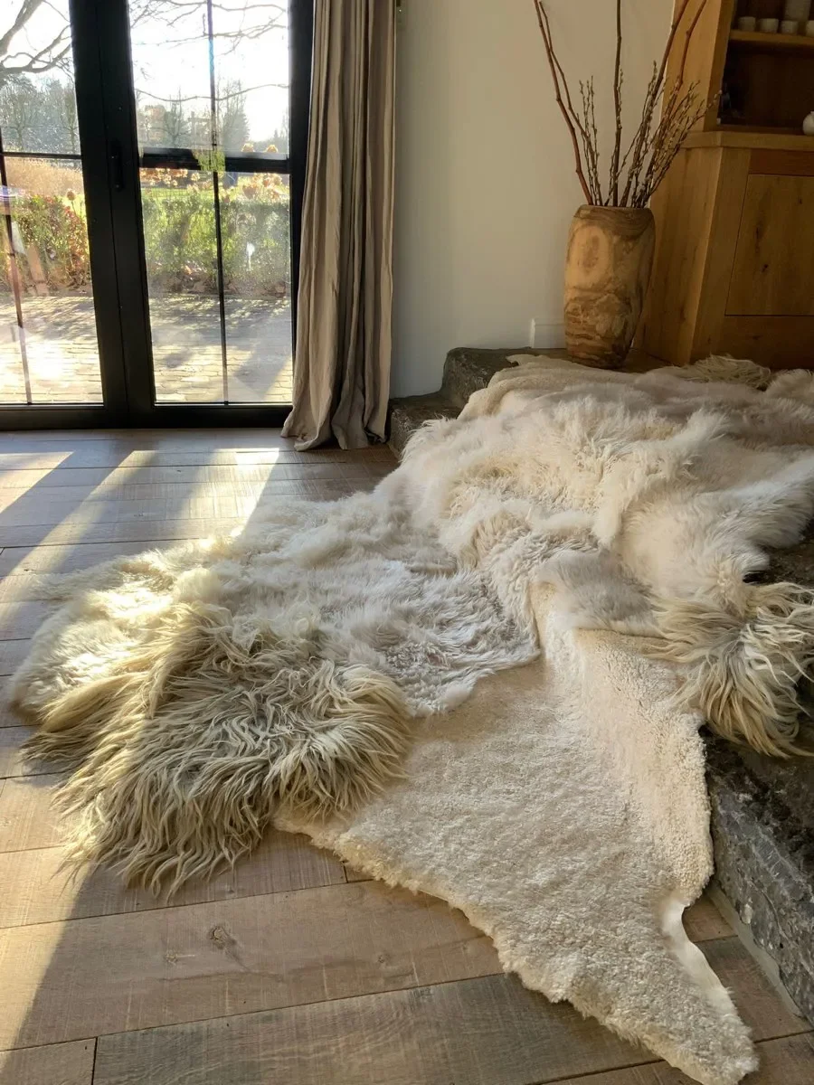 Ella by Wol Society, an ivory sheep skin rug with long grey-tipped locks over dense curls