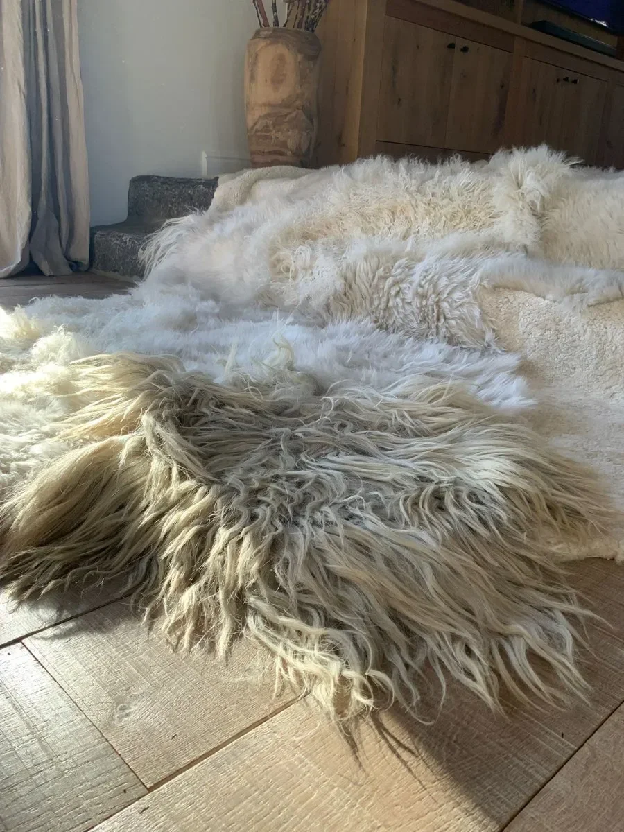 Ella by Wol Society, an ivory sheep skin rug with long grey-tipped locks over dense curls
