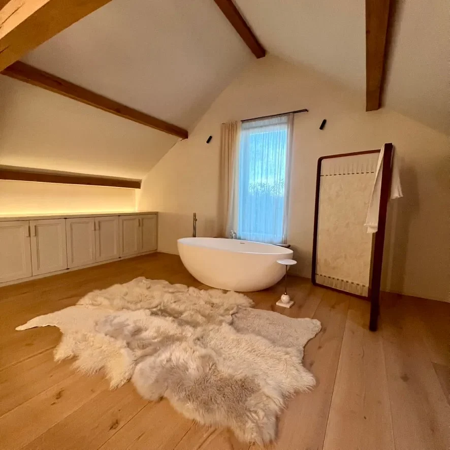 Punda by Wol Society, a dove grey and ivory sheep skin rug with soft, fluffy fleece