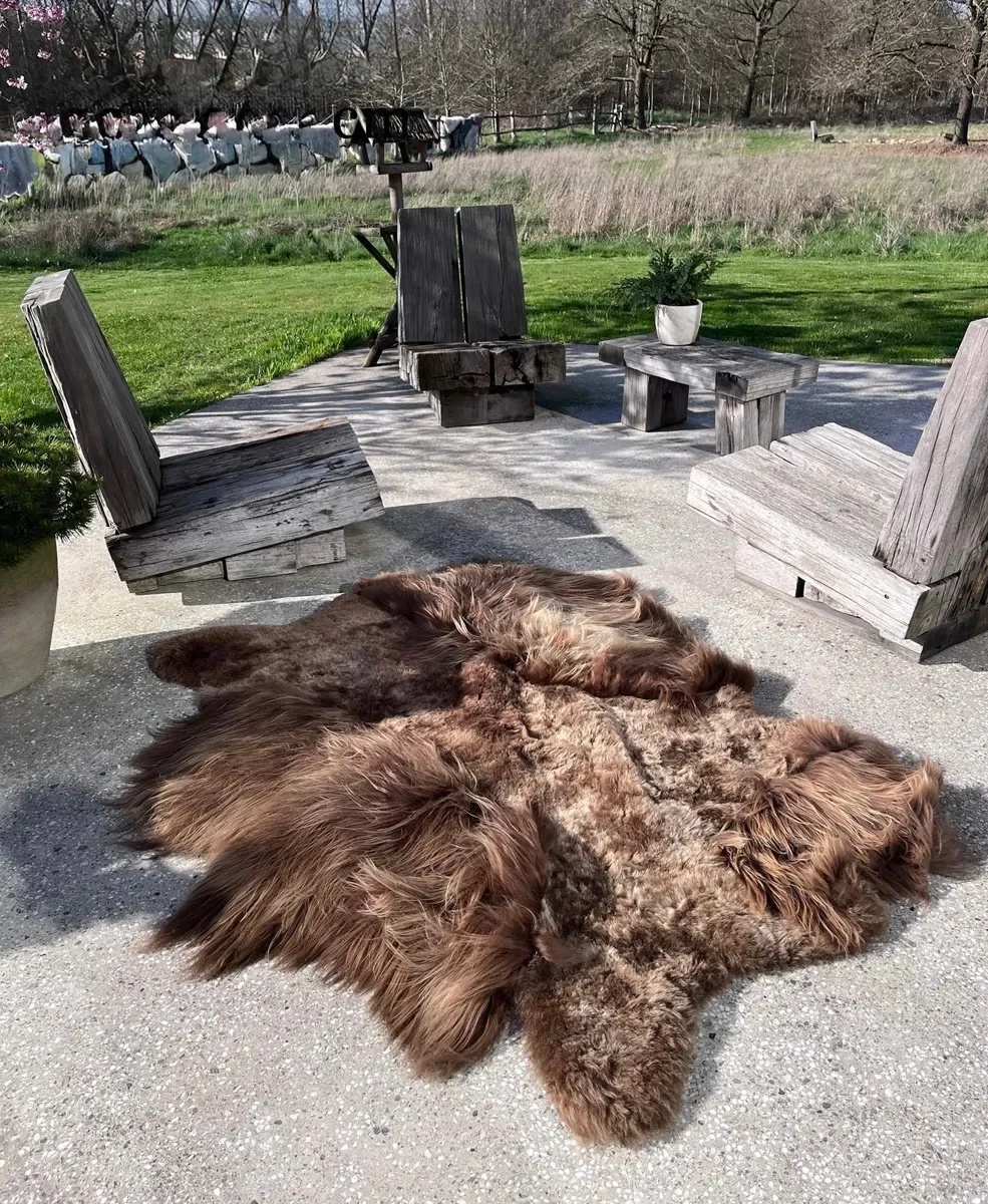 Miso by Wol Society, a shaggy taupe and grey-brown sheepskin rug with lighter tips