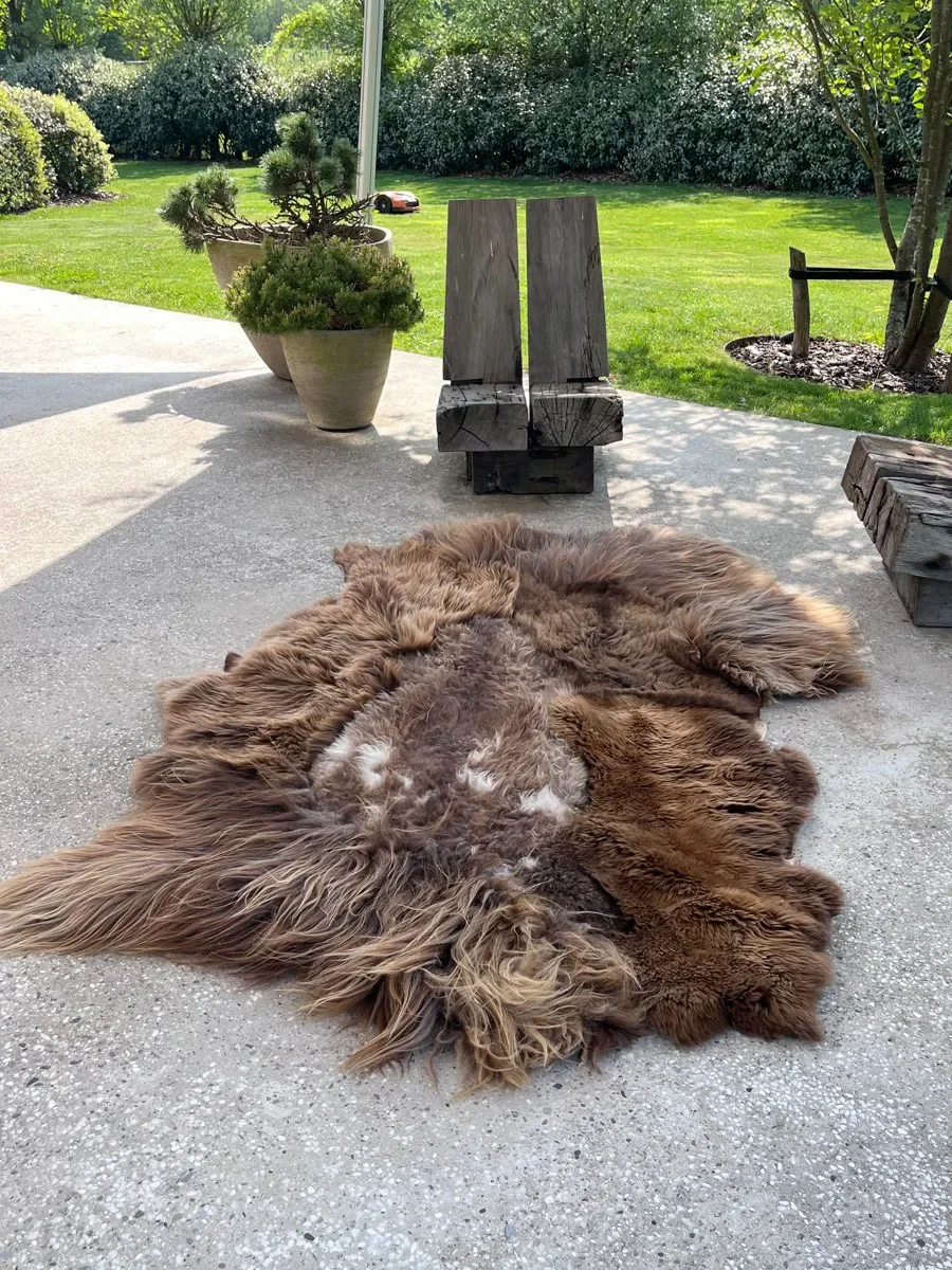 Baa-rista by Wol Society, a shaggy coffee-brown sheep skin rug with toffee tips and cream flecks.