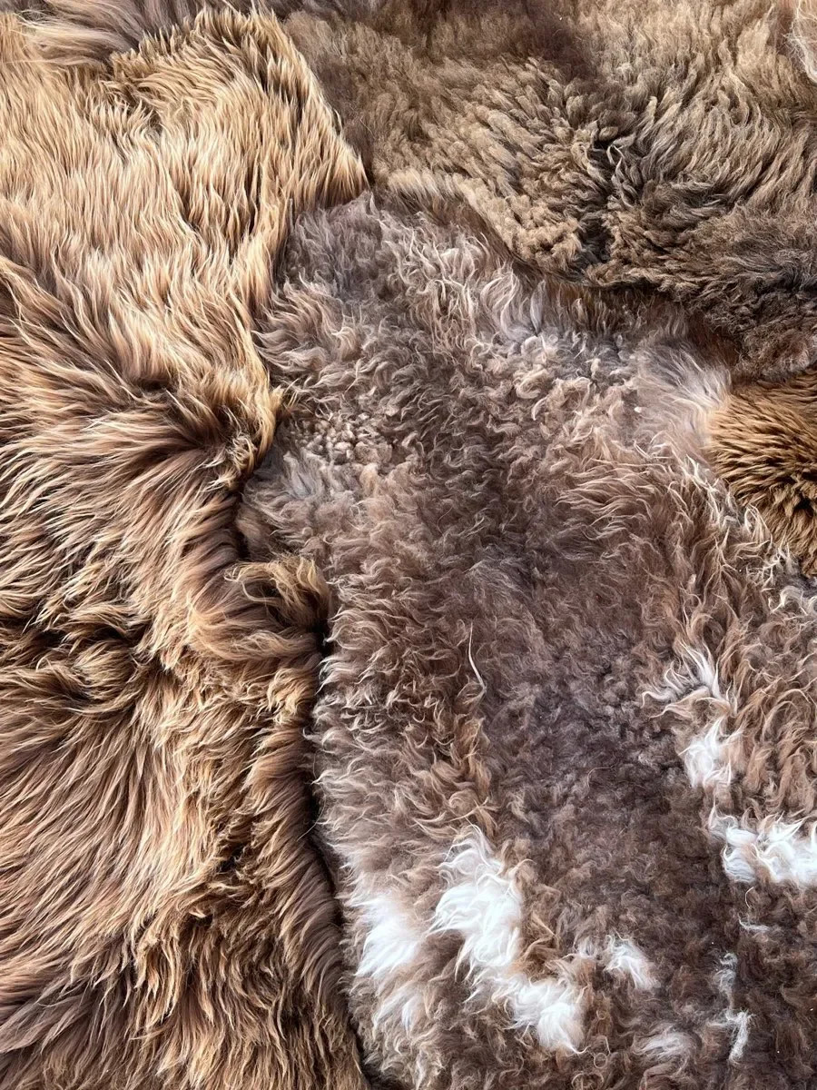 Baa-rista by Wol Society, a shaggy coffee-brown sheep skin rug with toffee tips and cream flecks.