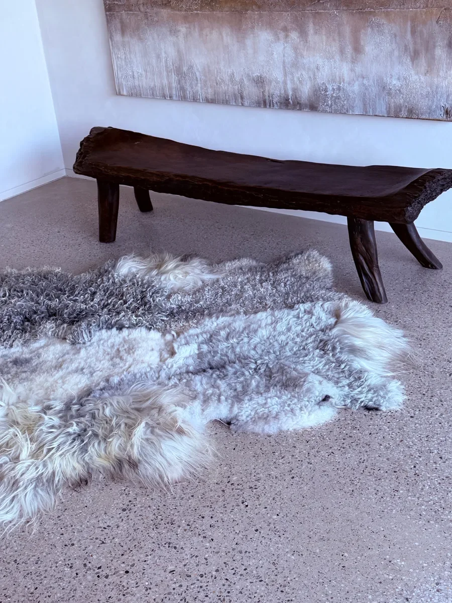 Silver Mist by Wol Society, an ivory and silver grey sheepskin rug with curly, frosted pelts