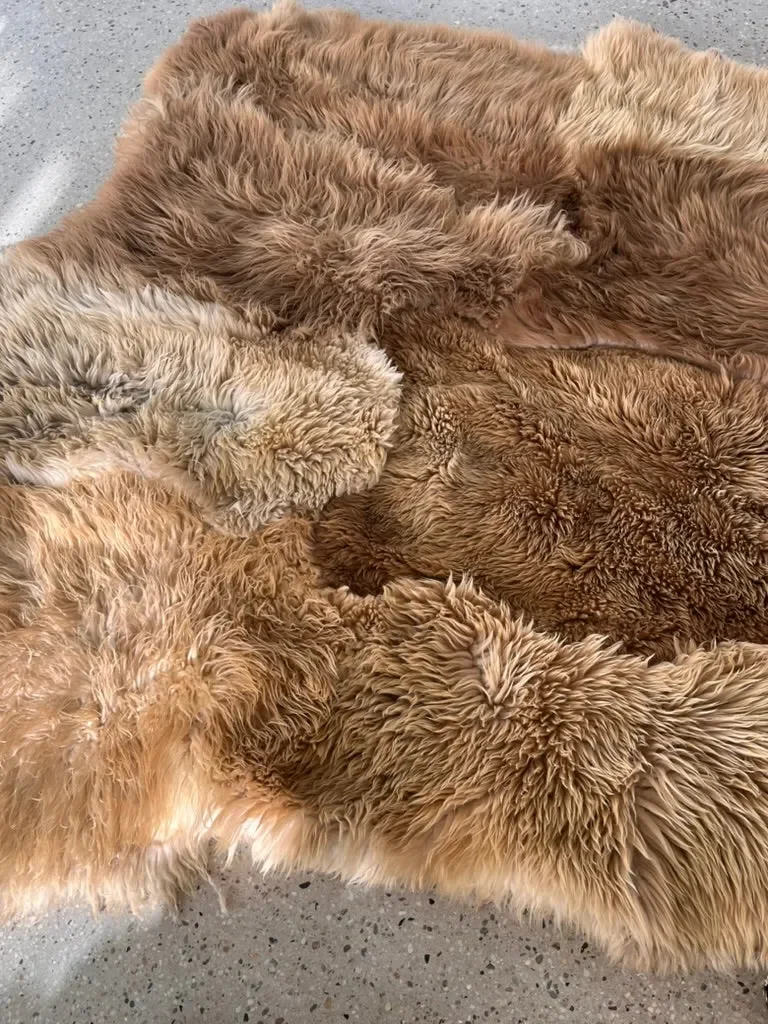 Mountain Hugs by Wol Society, a caramel and honey Heidsnucke sheep skin rug with plush fleece