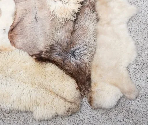 Vanilla by Wol Society, a cream and ivory sheep skin rug with taupe and grey-brown pelts