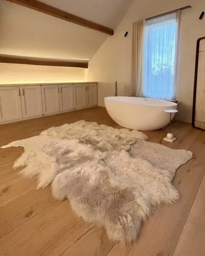 Punda by Wol Society, a dove grey and ivory sheep skin rug with soft, fluffy fleece