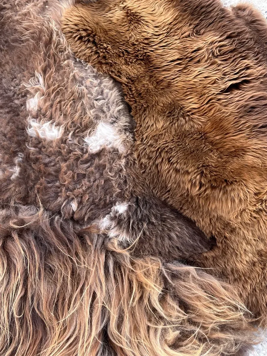 Baa-rista by Wol Society, a shaggy coffee-brown sheep skin rug with toffee tips and cream flecks.