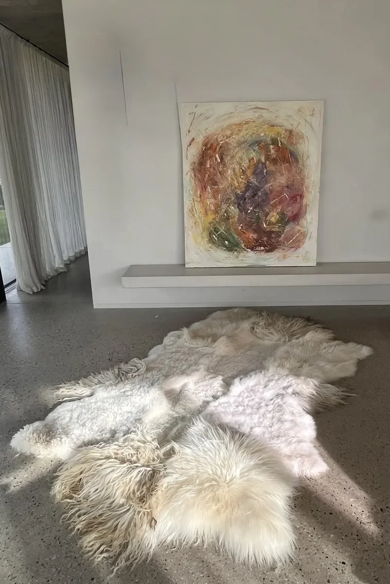 Snow White by Wol Society, a bright white sheepskin rug with long waves and soft curls