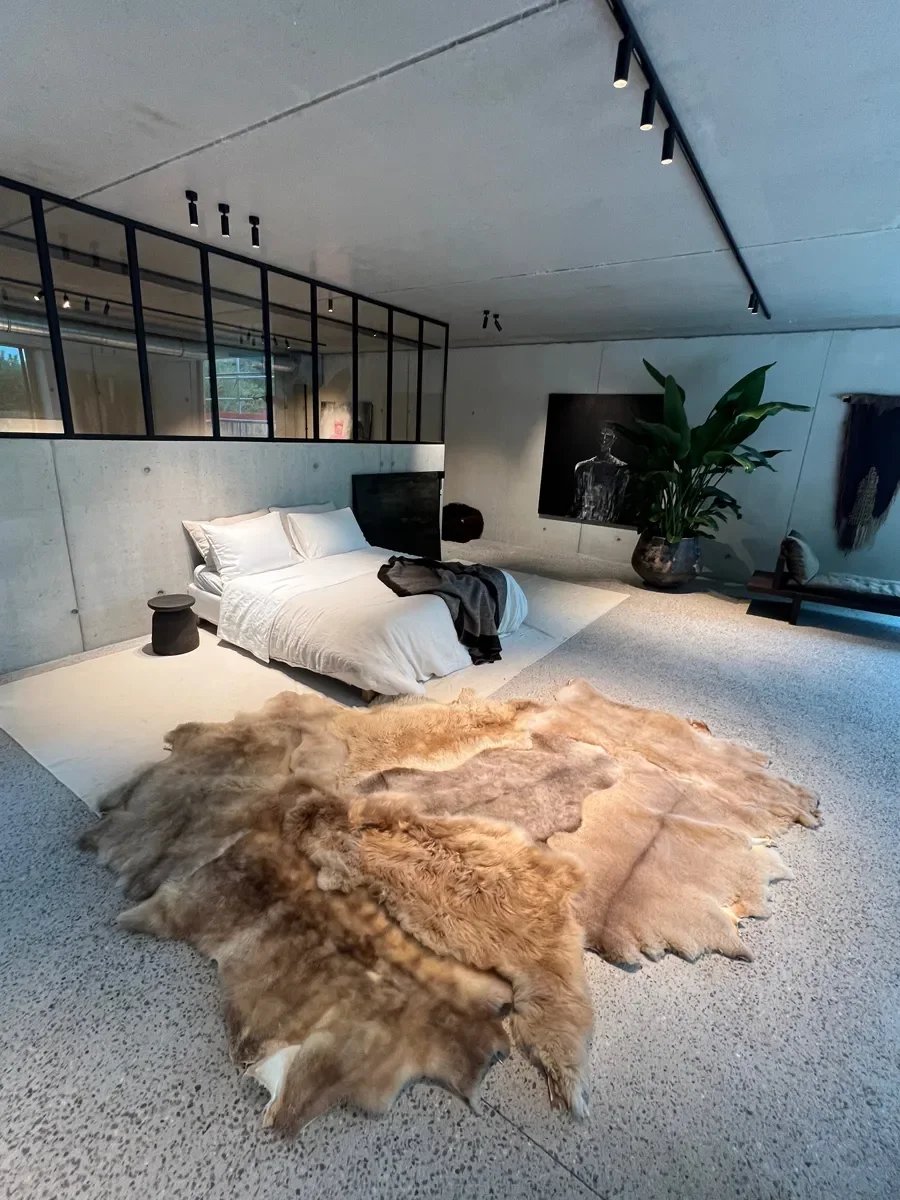 Mieke 202 by Wol Society, a taupe and silvery grey Shetland lambskin carpet.