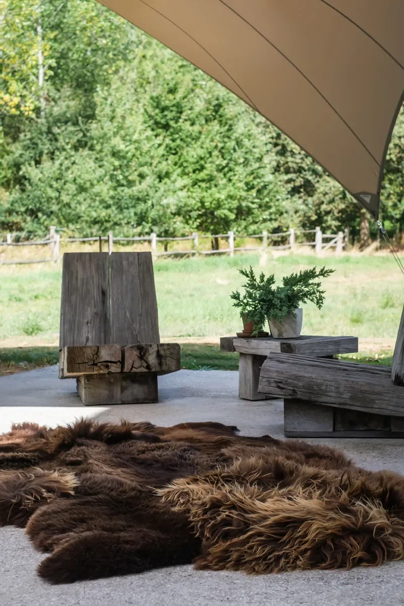 Zoomie by Wol Society, a shaggy chocolate brown sheepskin rug with honey-colored tips
