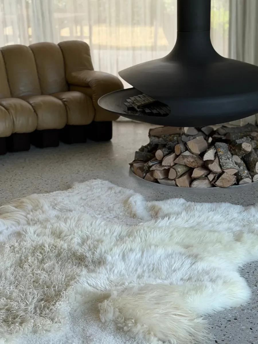 Milky Way by Wol Society, a white and cream sheep skin rug with a curly pale butter center