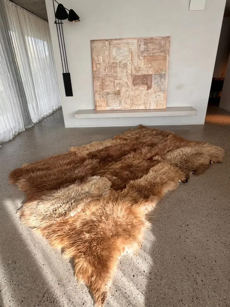 Mountain Hugs by Wol Society, a caramel and honey Heidsnucke sheep skin rug with plush fleece