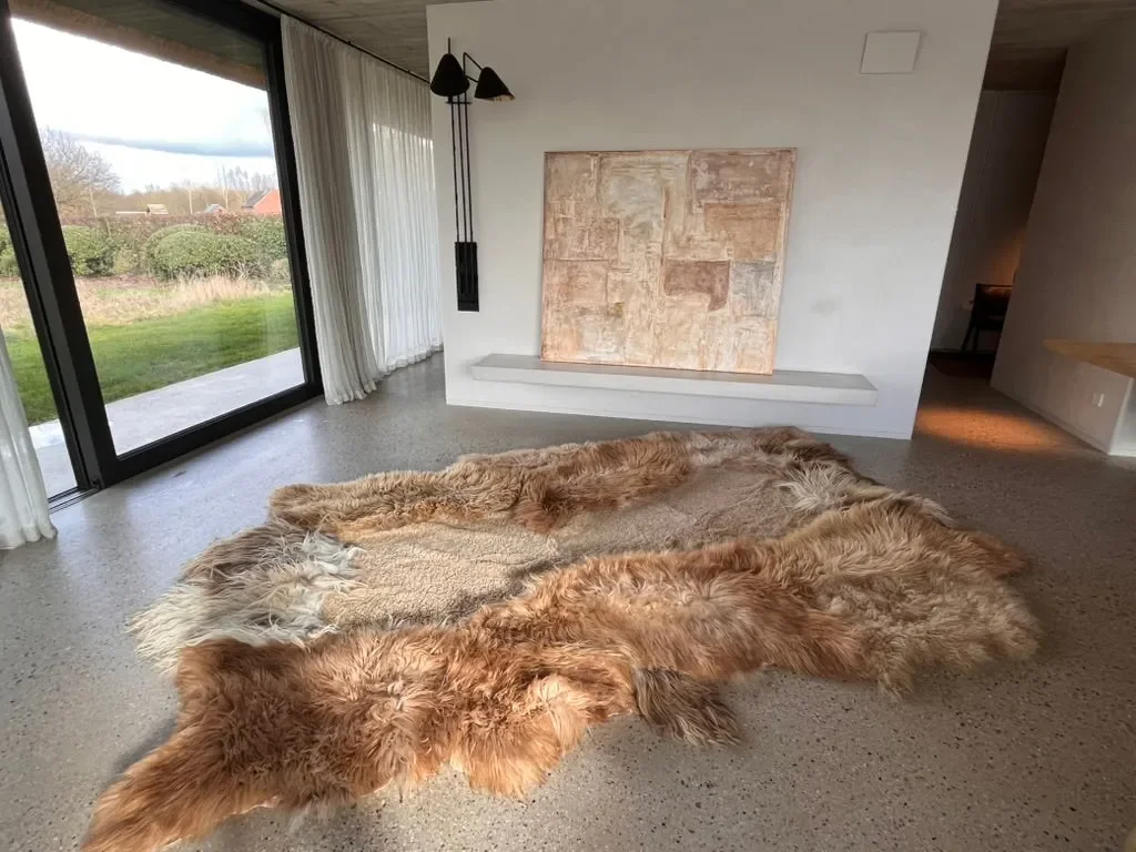 Big Dream by Wol Society, a giant sheepskin rug in caramel and cream with long, silky fleece