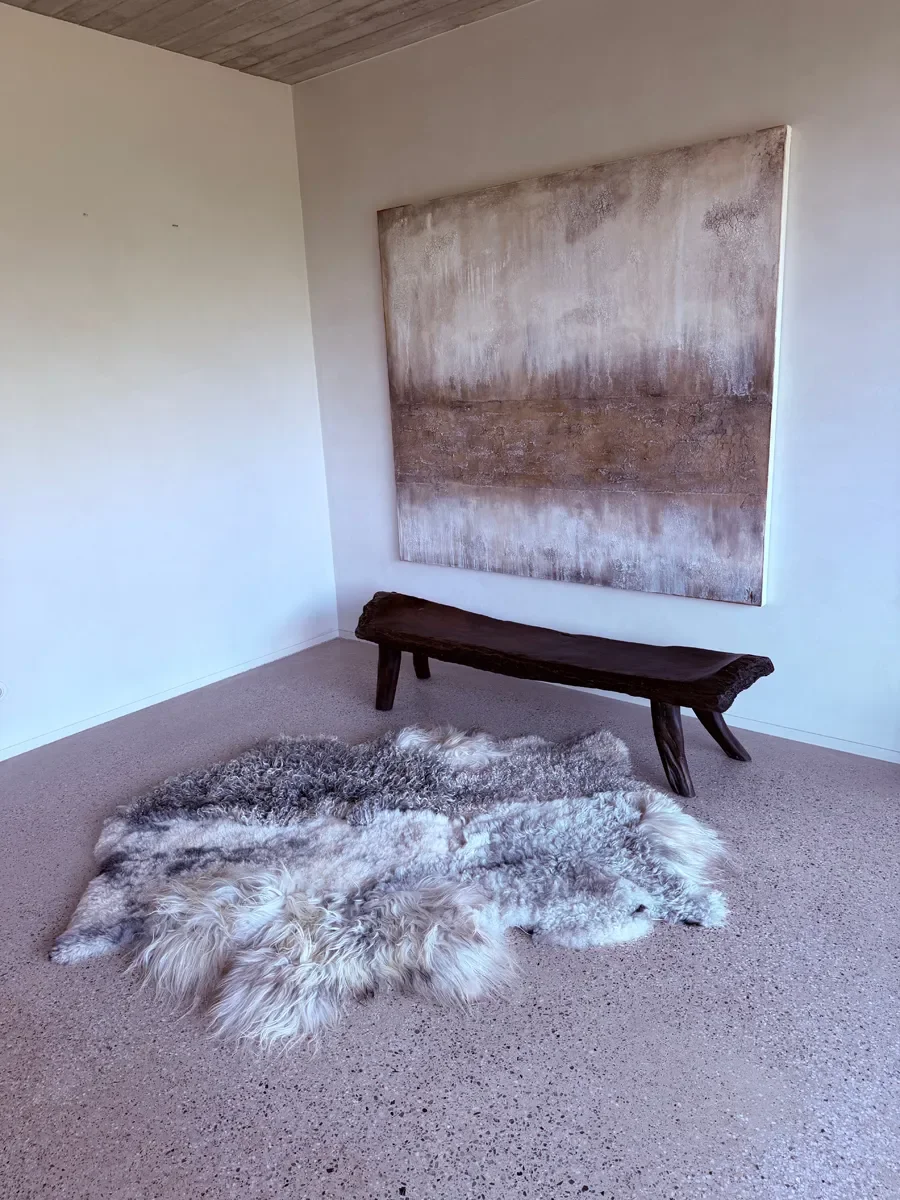 Silver Mist by Wol Society, an ivory and silver grey sheepskin rug with curly, frosted pelts