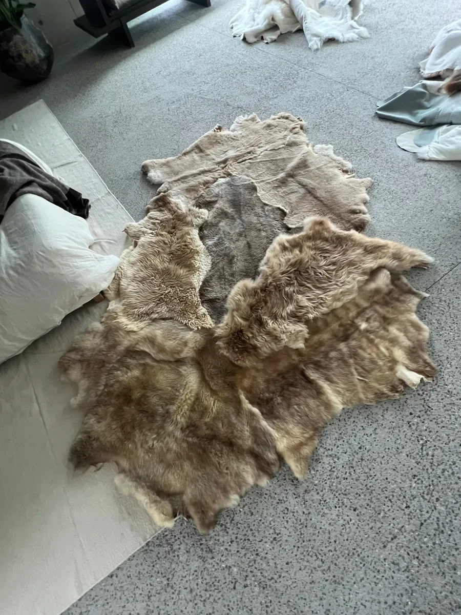 Mieke 202 by Wol Society, a taupe and silvery grey Shetland lambskin carpet.