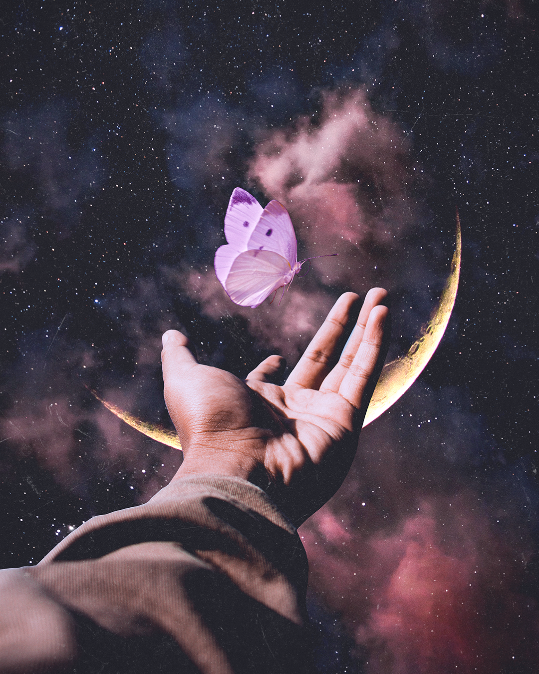 A person’s hand reaching out in space with a pink butterfly flying near the fingertips, a crescent moon in the background, stars, and pink clouds surrounding the scene.