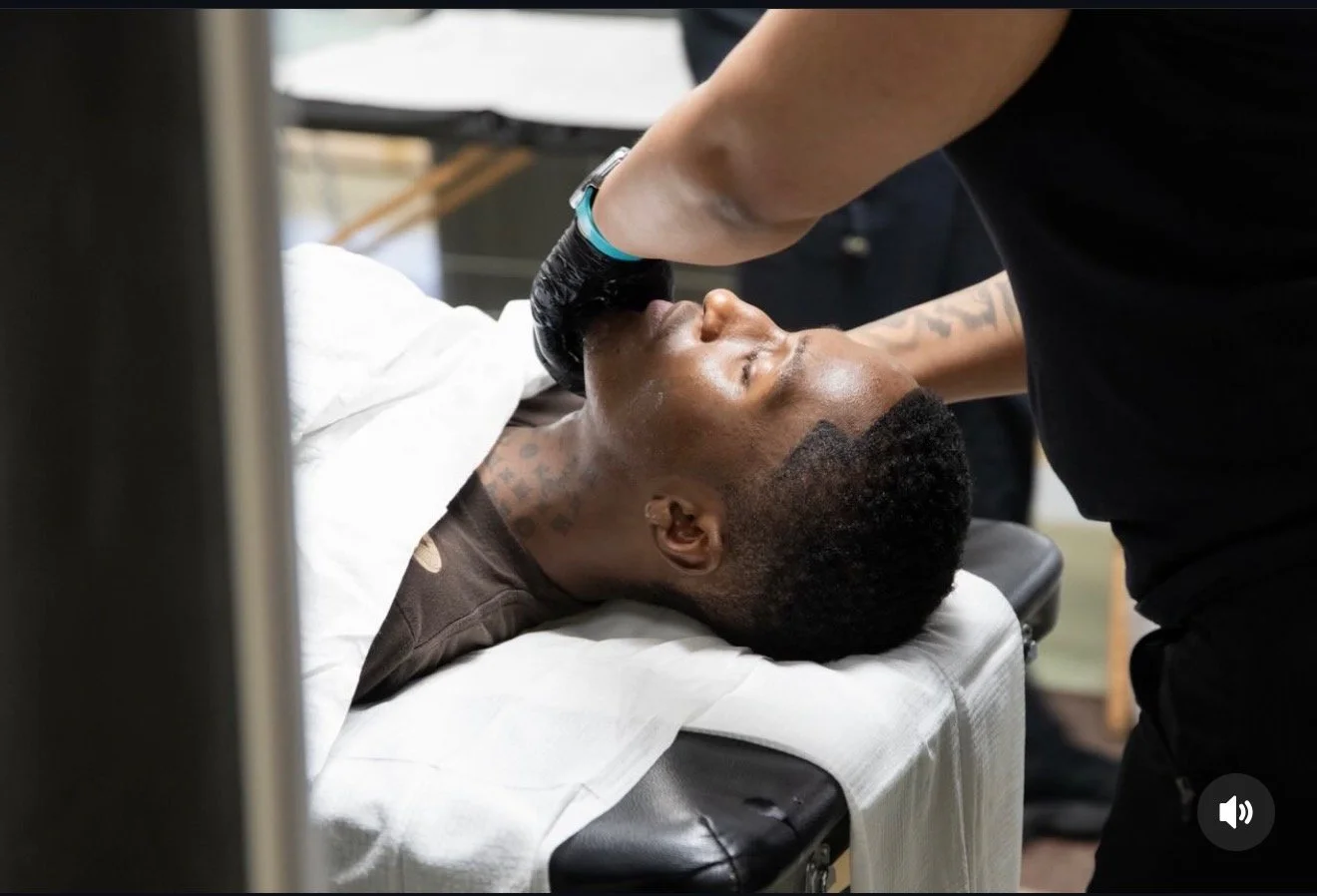 Licensed esthetician performing a personalized facial at The Phoenix Aesthetic, offering luxury facials, dermaplaning, brow services, and waxing near Hartsfield-Jackson Atlanta International Airport.
