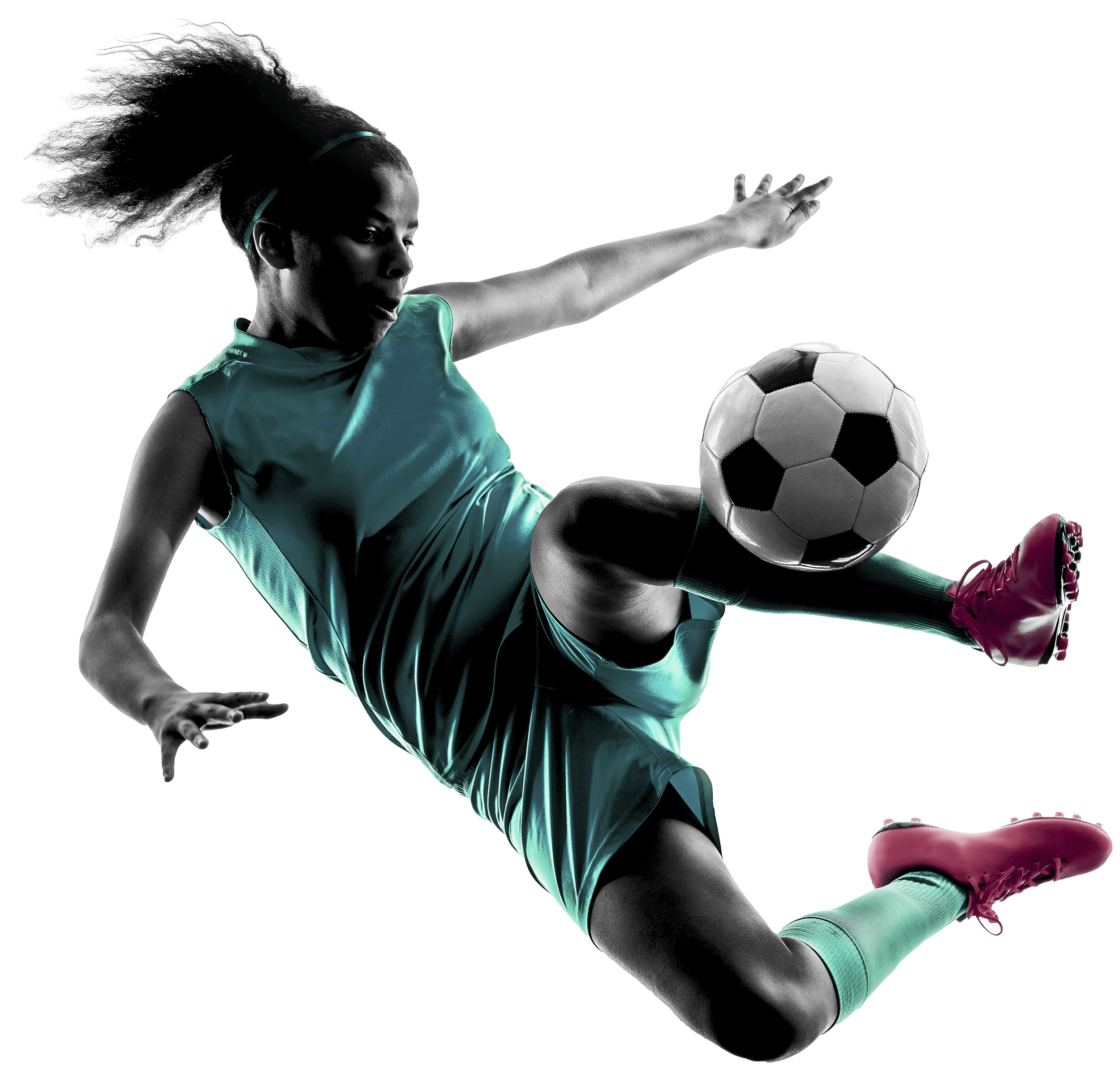 Silhouette of a young woman mid-kick controlling a soccer ball, rim-lit against a black background.