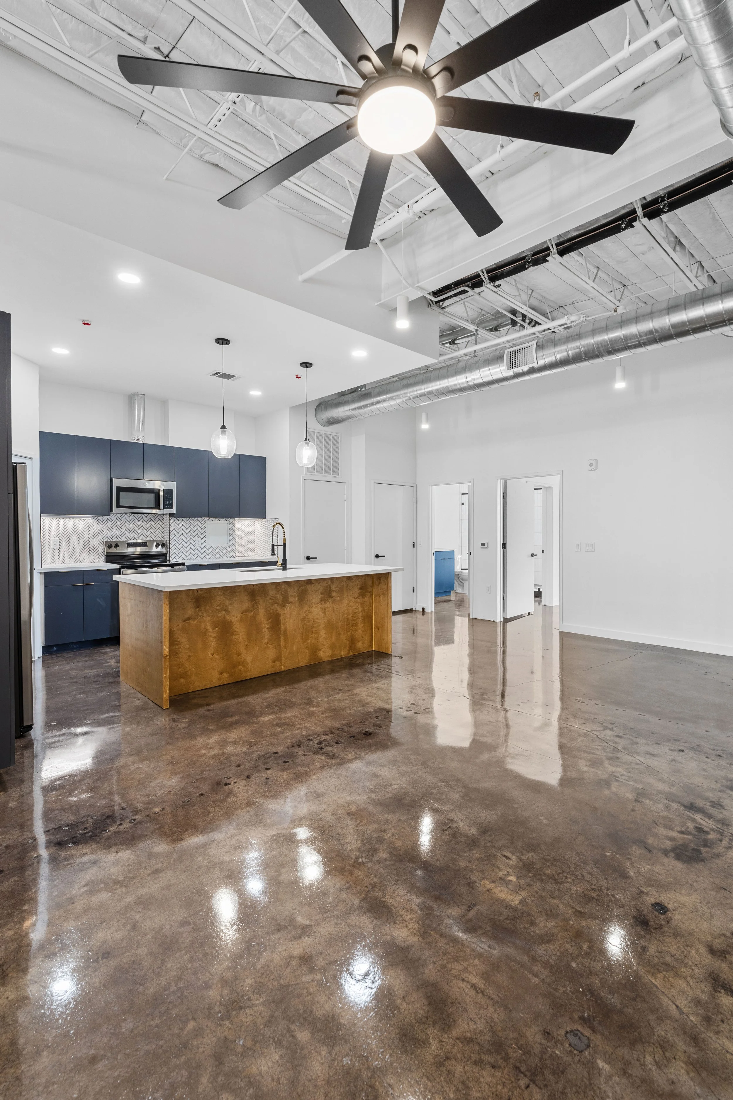 The Residences at Bienville kitchen and oversized living area