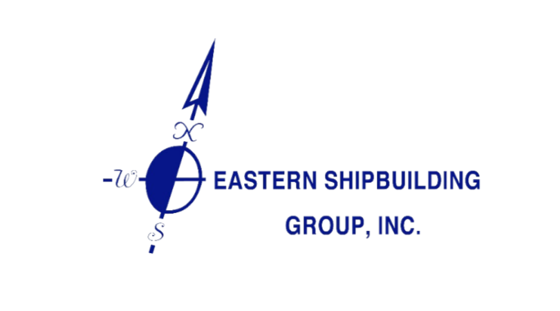 Logo for Eastern Shipbuilding Group, Inc., featuring a compass with an arrow pointing north and the company name in blue text.