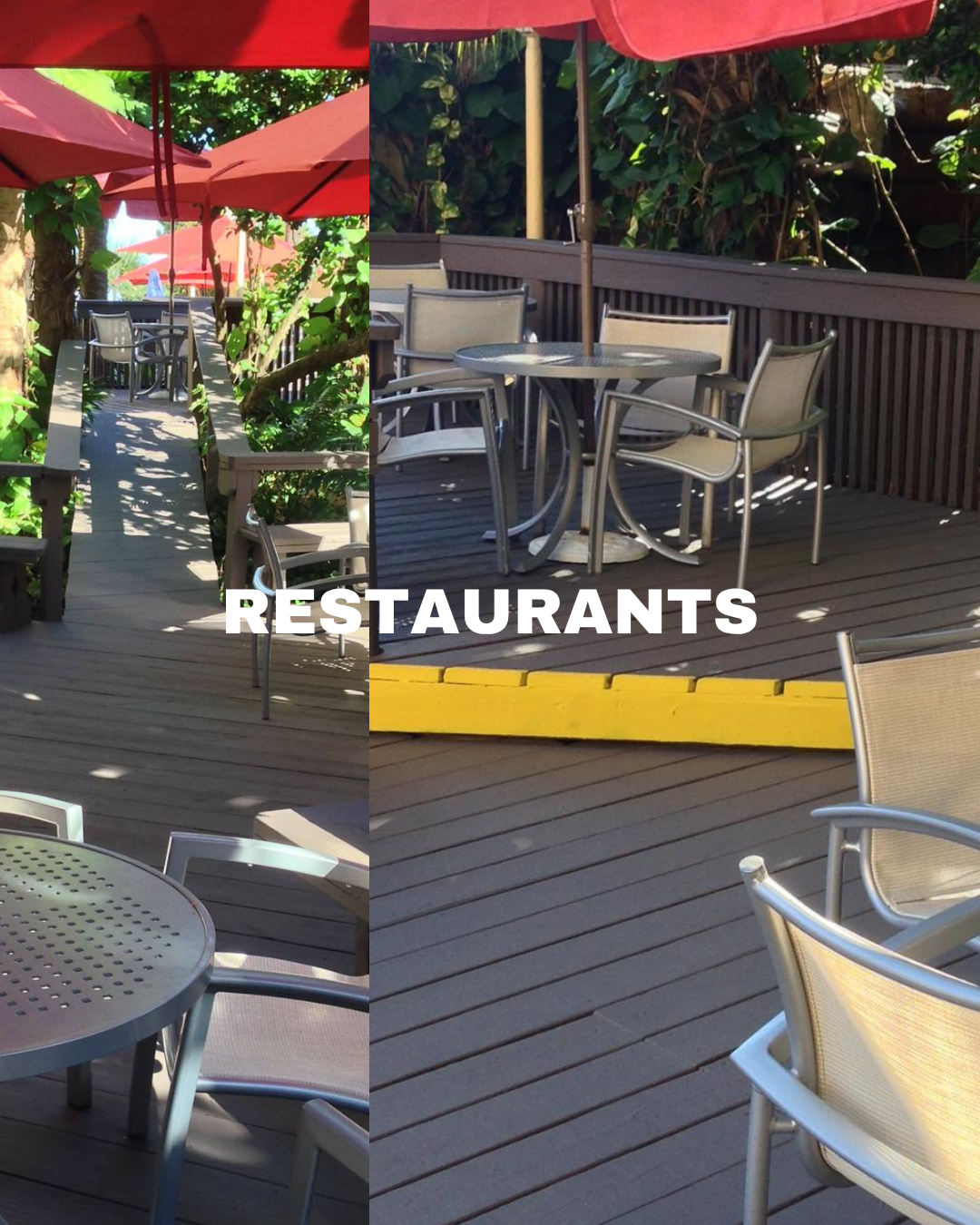 Outdoor restaurant patio with tables, chairs, red umbrellas, and lush greenery.