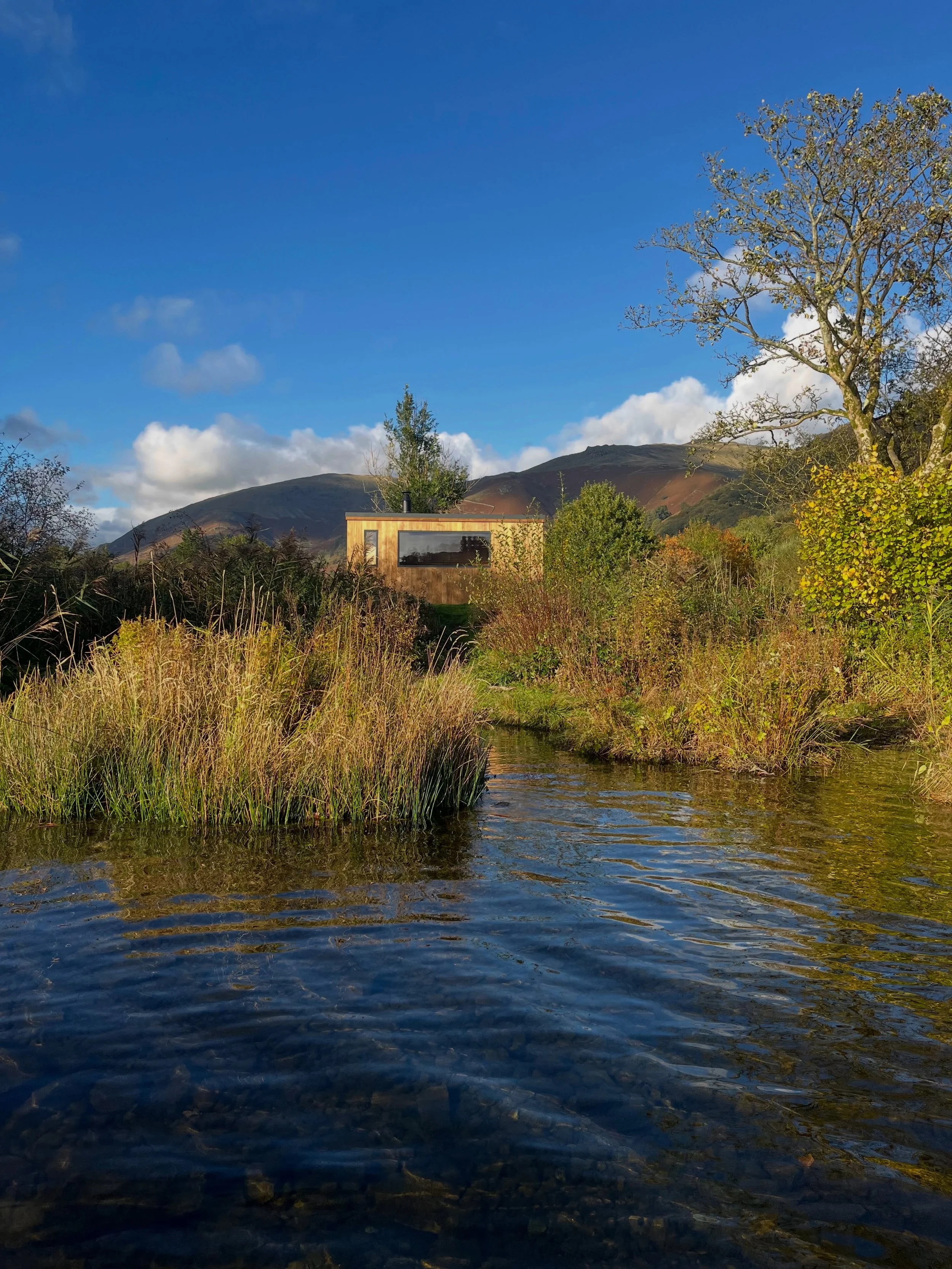 So, here she is&hellip;

After months of planning, building and bringing this little dream to life, it&rsquo;s time for the reveal!

Your first proper look at Mere Sauna. 

Nestled among the golden reeds on the shores of Grasmere, with the beautiful 