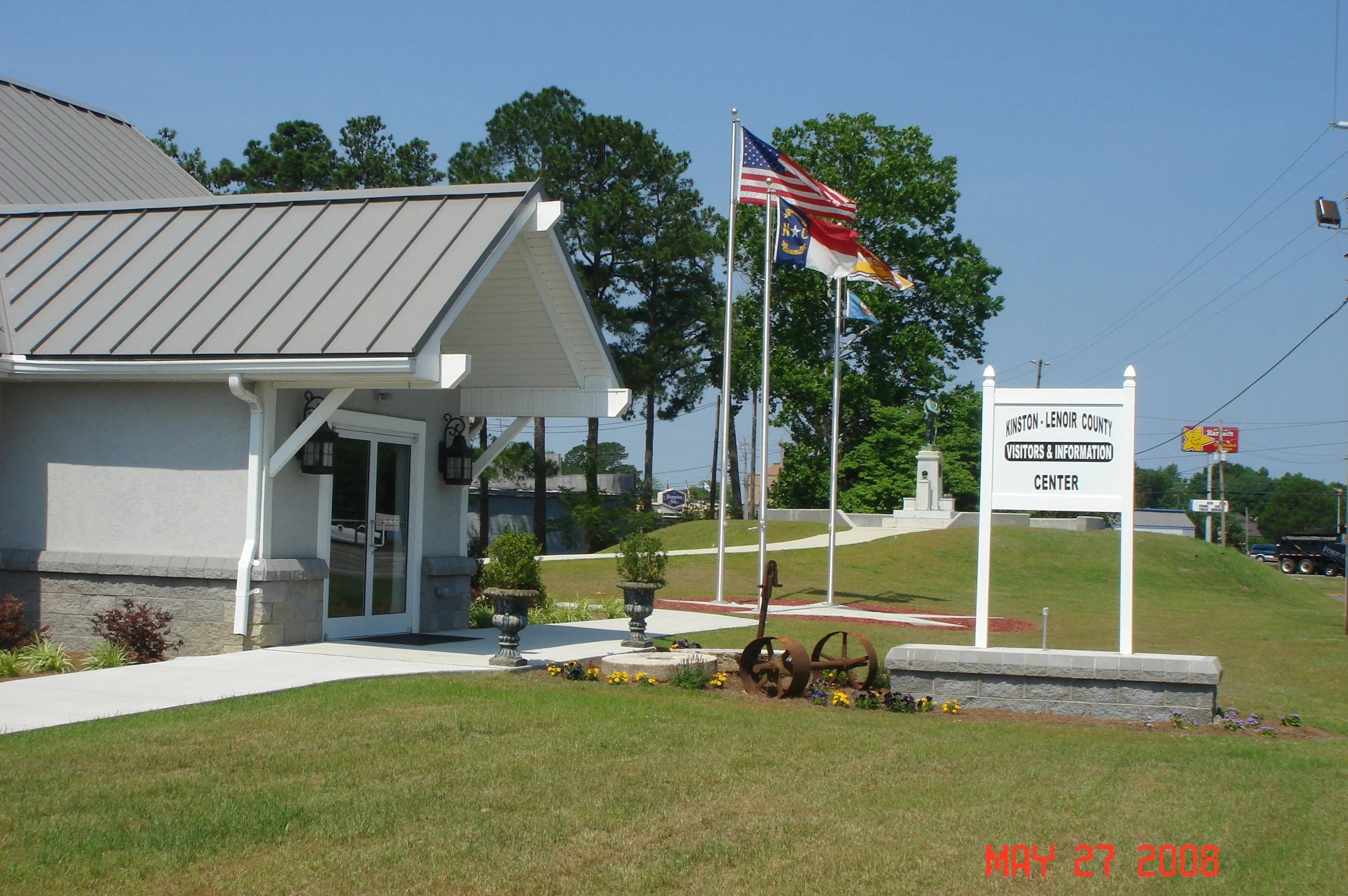 United States and North Carolina flags at the Lenoir County Visitors Center