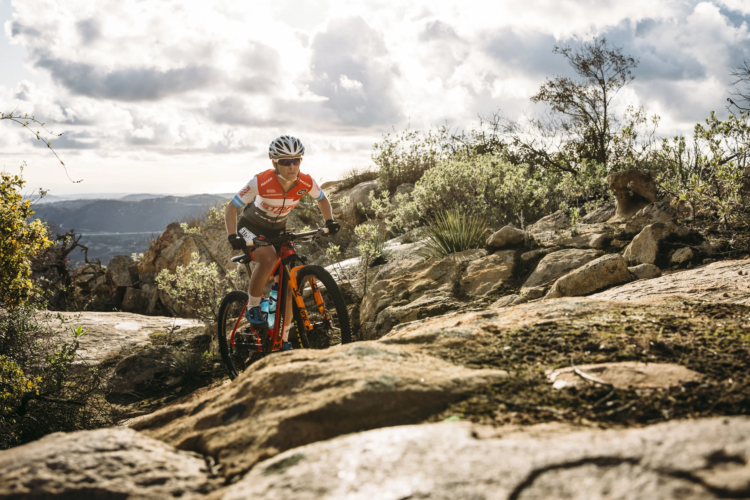 CHLOE WOODRUFF CLIMBING THE ROCKS
